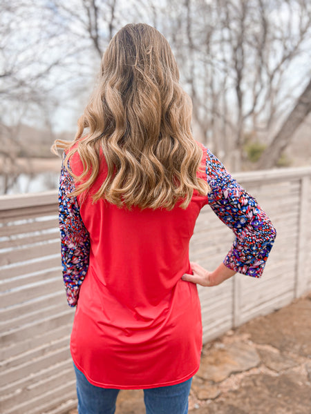 Ruth Salmon Top With Floral Sleeves - Ribbons and Spice Boutique