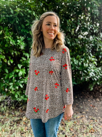 Giselle Animal Print Top with Red Roses - Ribbons and Spice Boutique